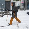 Photos: Nor'easter Leaves Many Trudging, Biking, & Skiing Across Snowy NYC Landscape